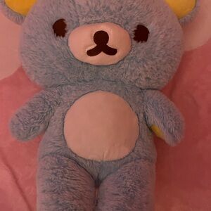 Blue and Yellow Stuffed Bear Toy